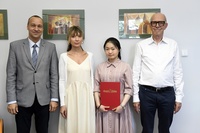 prorektor ds. nauki prof. Tomasz Bączek, prof. Iwona Inkielewicz-Stępniak, Shaoshan Mai, kanclerz Marek Langowski